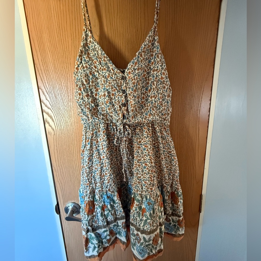 Floral Sleeveless Dress with Button Detail